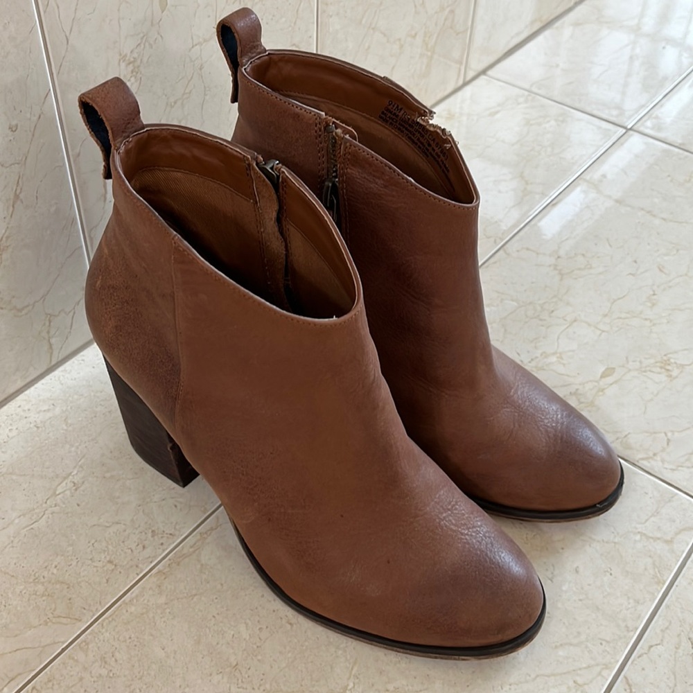 Booties, small tear in leather